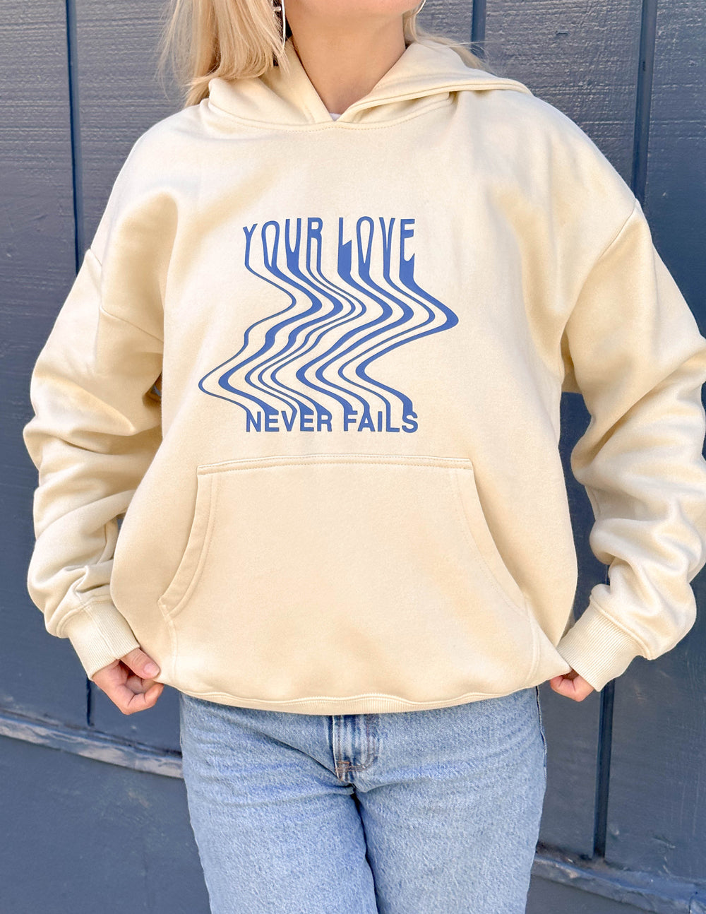 Love-Never-Fails-Cream-Unisex-Hoodie_01_0bf0ed8e-3a90-4520-ad38-261084946252.jpg