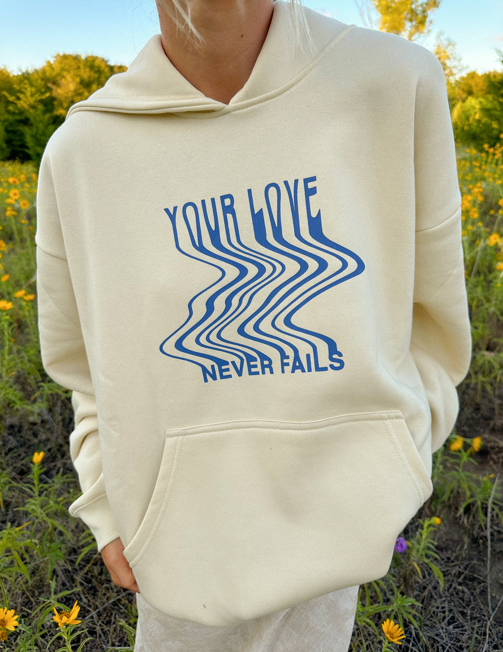 Love-Never-Fails-Cream-Unisex-Hoodie_03.jpg